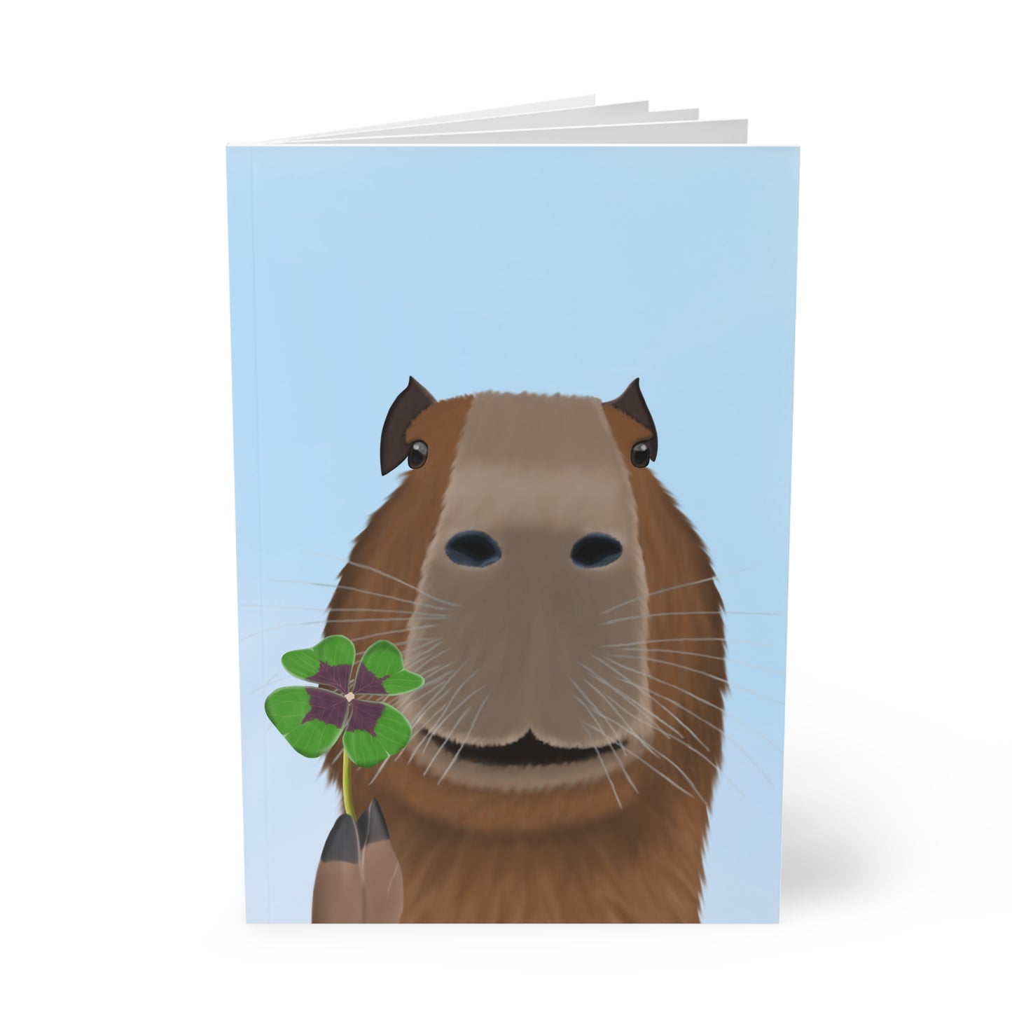 Capybara mit Glücksklee A5 Softcover Notizbuch 150 Seiten Liniert