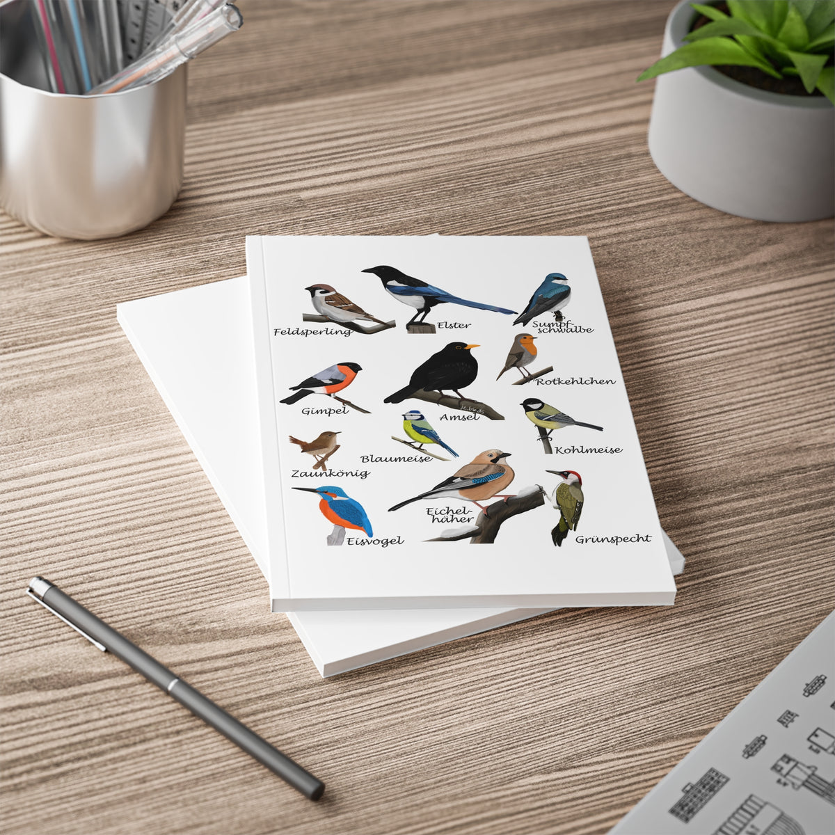 Rotkehlchen, Blaumeise, Zaunkönig und Amsel Notizbücher mit a5 notebook Hintergrund