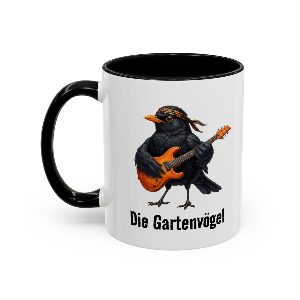 Tasse mit einer Amsel, die Gitarre spielt, und dem Text „Die Gartenvögel“ auf weißem Hintergrund