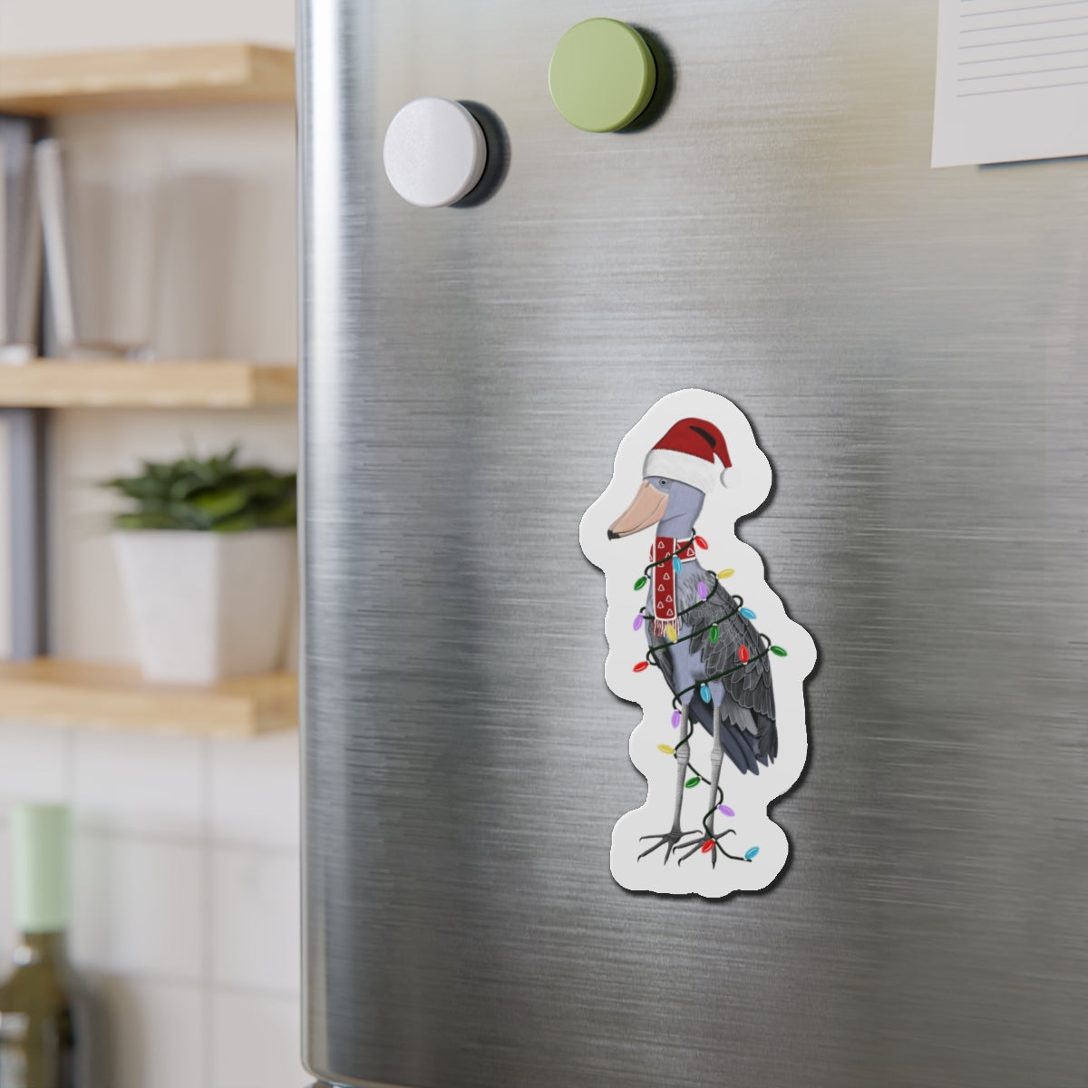 フェアリーライトとスカーフをつけたハシビロコウのクリスマスバードマグネット