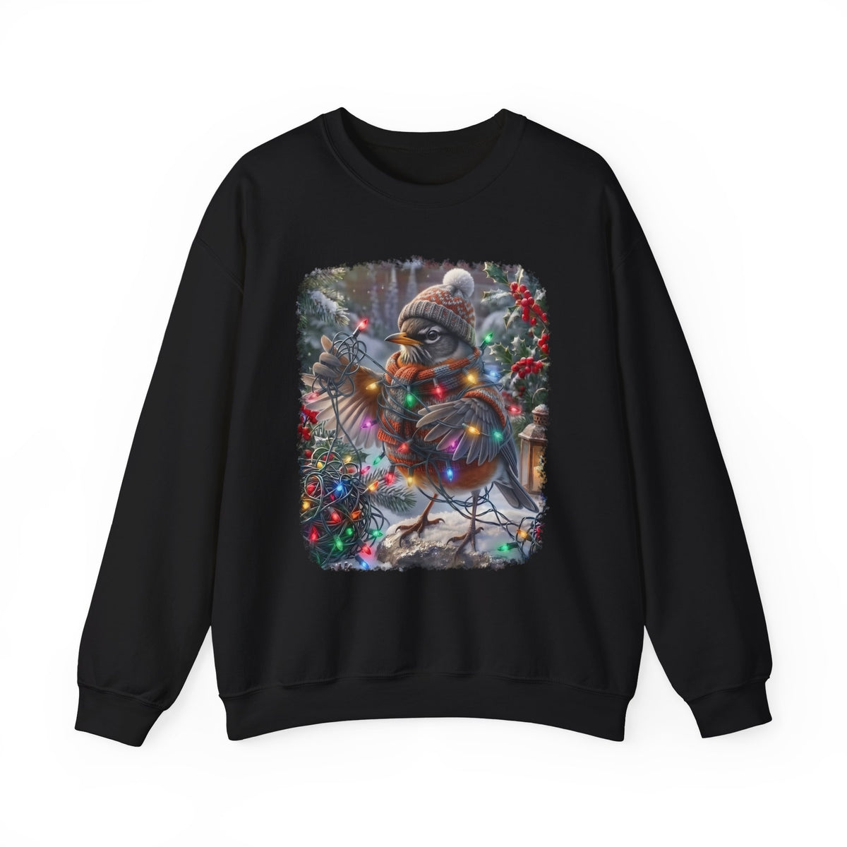 A black crewneck sweatshirt featuring a square graphic print of a robin bird wearing a knit hat and scarf, surrounded by colorful Christmas lights and festive decorations.