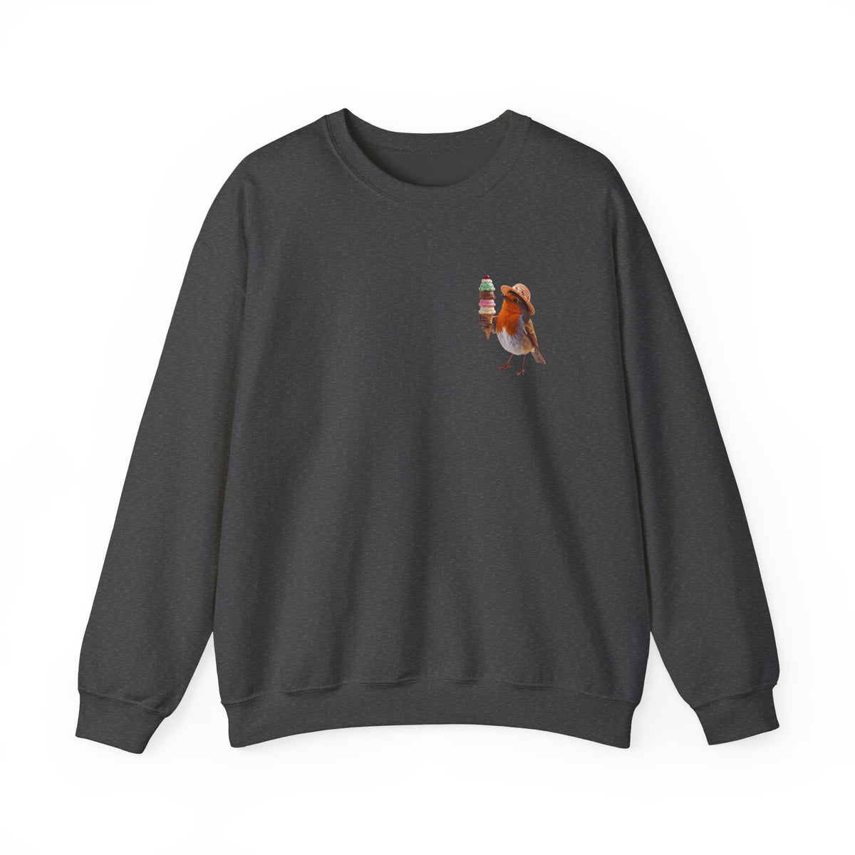 Close-up of the subtle pocket-sized design on the cozy sweatshirt, highlighting the bright colors of the cute Robin Rosi bird and ice cream illustration against the soft fabric.