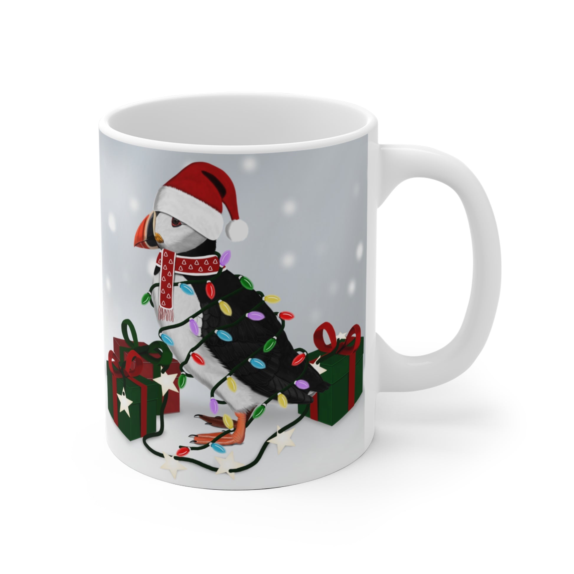 Papageitaucher mit Lichterkette im Winter Weihnachten Schnee Vogel Tasse