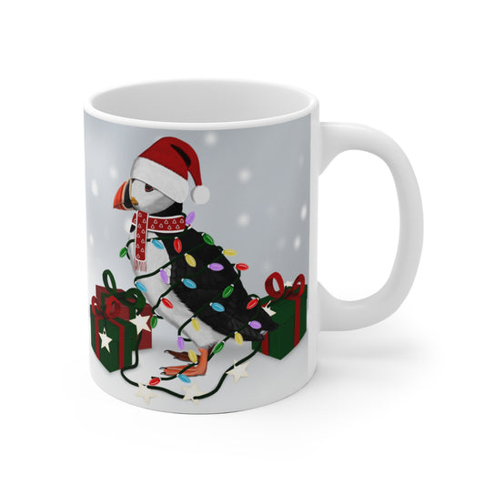 Papageitaucher mit Lichterkette im Winter Weihnachten Schnee Vogel Tasse