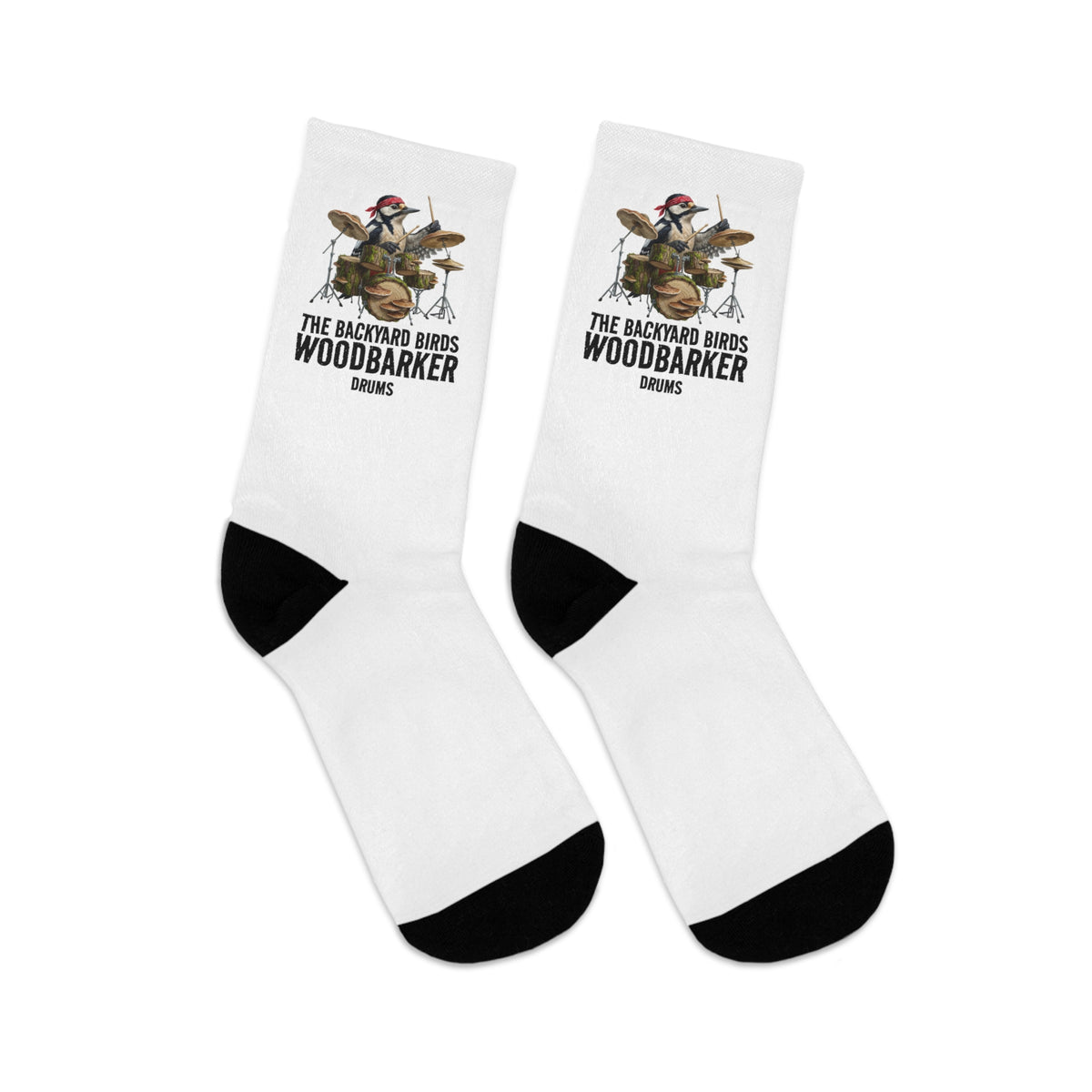 White socks with a bird drummer graphic design and text on a white background