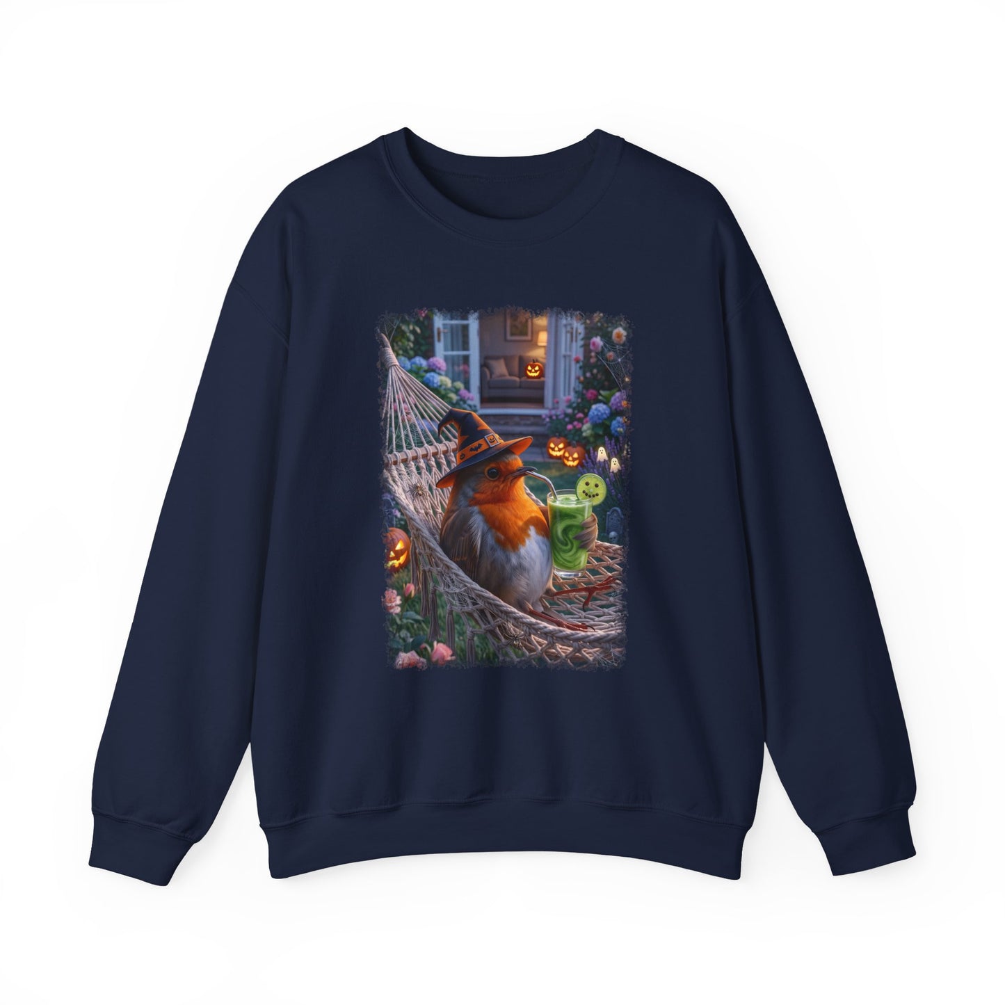 A navy blue crewneck sweatshirt featuring a large rectangular graphic print on the front. The graphic depicts a robin bird dressed as a witch sitting in a hammock surrounded by Halloween decorations, including jack-o'-lanterns and a green drink.