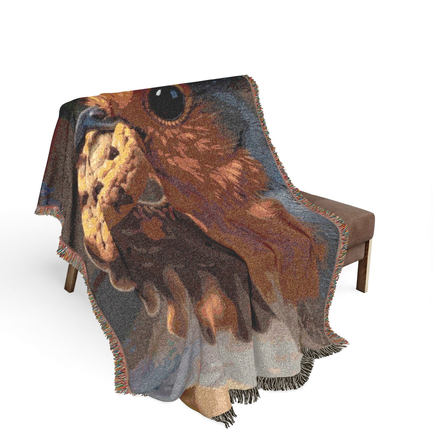 A woven throw blanket with fringe is draped over a brown upholstered bench. The blanket features a large, detailed graphic print of an robin bird in warm brown, orange, and gray tones against a white studio background.
