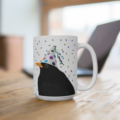 Amsel feiert Geburtstag mit Partyhut und Konfetti Vogel Tasse