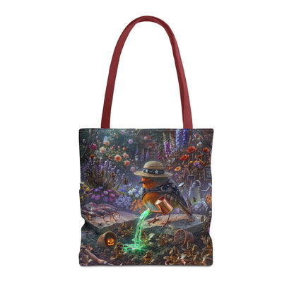 A tote bag with dark red handles and a detailed fantasy illustration printed on the front, featuring a robin bird in a hat near glowing green elements, shown against a plain white background.