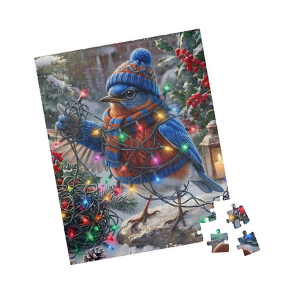 A completed jigsaw puzzle showing a bluebird wearing a blue knit hat and scarf, wrapped in multicolored Christmas lights in a snowy winter scene, with a few loose puzzle pieces shown at the bottom right on a white background.