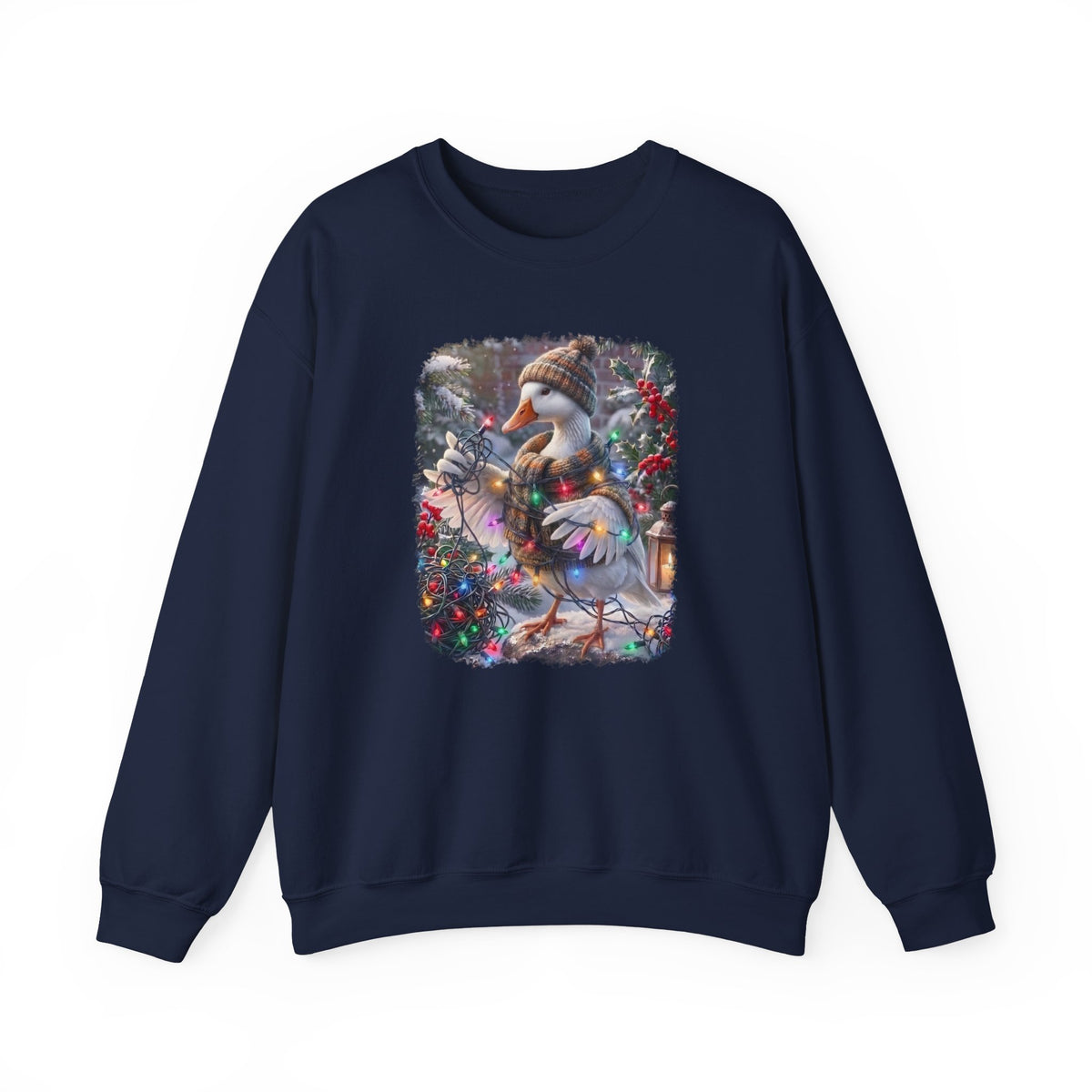 A navy blue crewneck sweatshirt featuring a large, colorful graphic print on the front of a snowy goose wearing a knit hat and scarf amidst winter foliage.