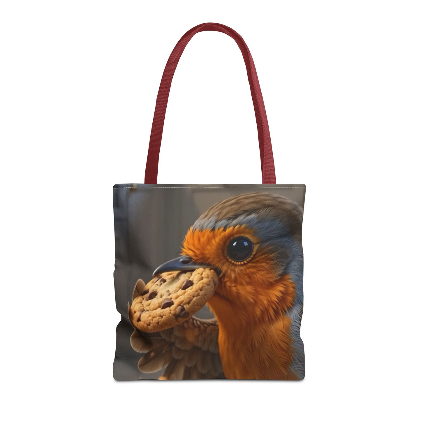 A tote bag with a printed design of a robin holding a cookie, featuring dark red shoulder straps, shown against a plain white background.