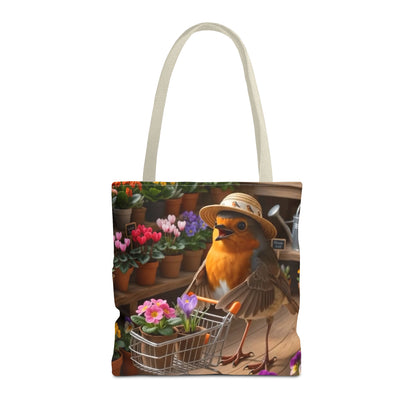 A cream canvas tote bag featuring a printed illustration of a robin bird wearing a safari hat and pushing a shopping cart filled with flowers in a flower shop setting.