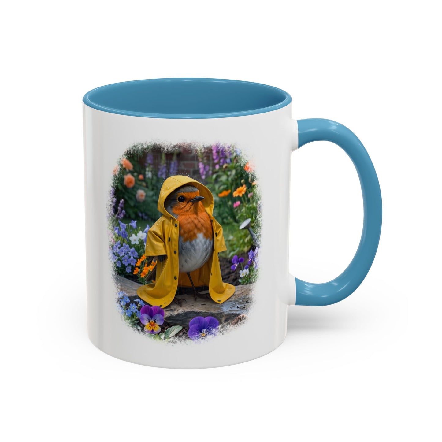 A white ceramic mug with a blue interior and handle, featuring a printed illustration of a robin wearing a yellow raincoat amidst purple and orange flowers.