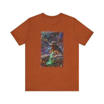 Soft premium Bella Canvas 3001 autumn colored T-shirt featuring a digitally painted illustration of a cute bird named Robin Rosi pouring a glowing green magic potion from a watering can onto dried flowers.