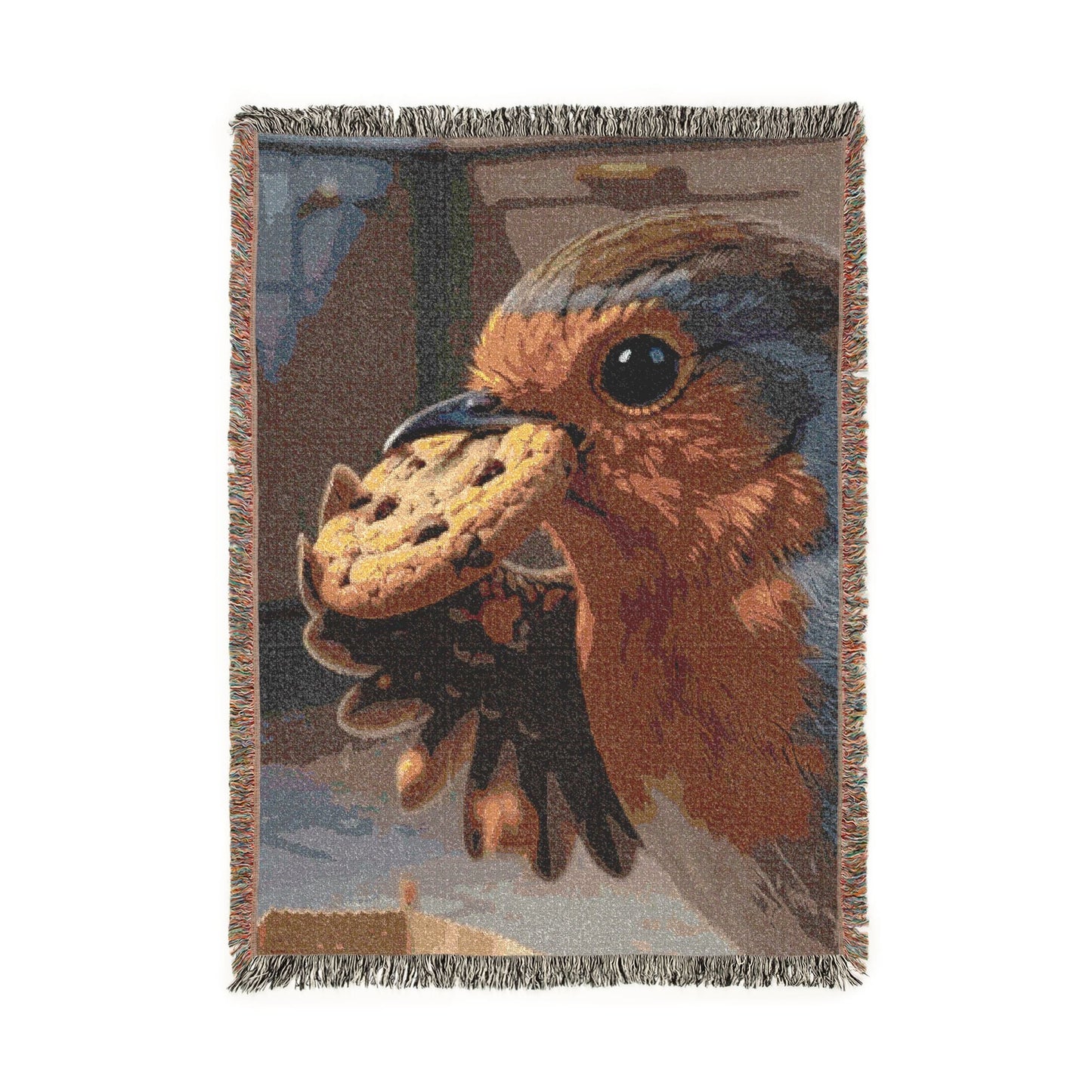 A rectangular woven throw blanket with fringed edges, featuring a detailed tapestry-style illustration of a robin bird with a cookie in its beak, shown on a plain white background.