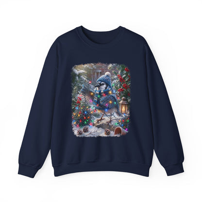 A navy blue crewneck sweatshirt featuring a large, colorful graphic print of a blue jay decorated for Christmas on a snowy porch.