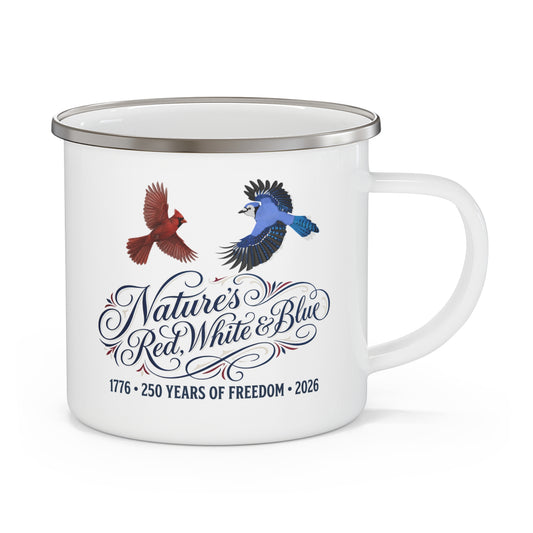 A classic white 12oz enamel camp mug featuring a detailed illustration of a flying Blue Jay and Northern Cardinal above the elegant text Nature's Red, White & Blue, celebrating 250 years of freedom (1776-2026).