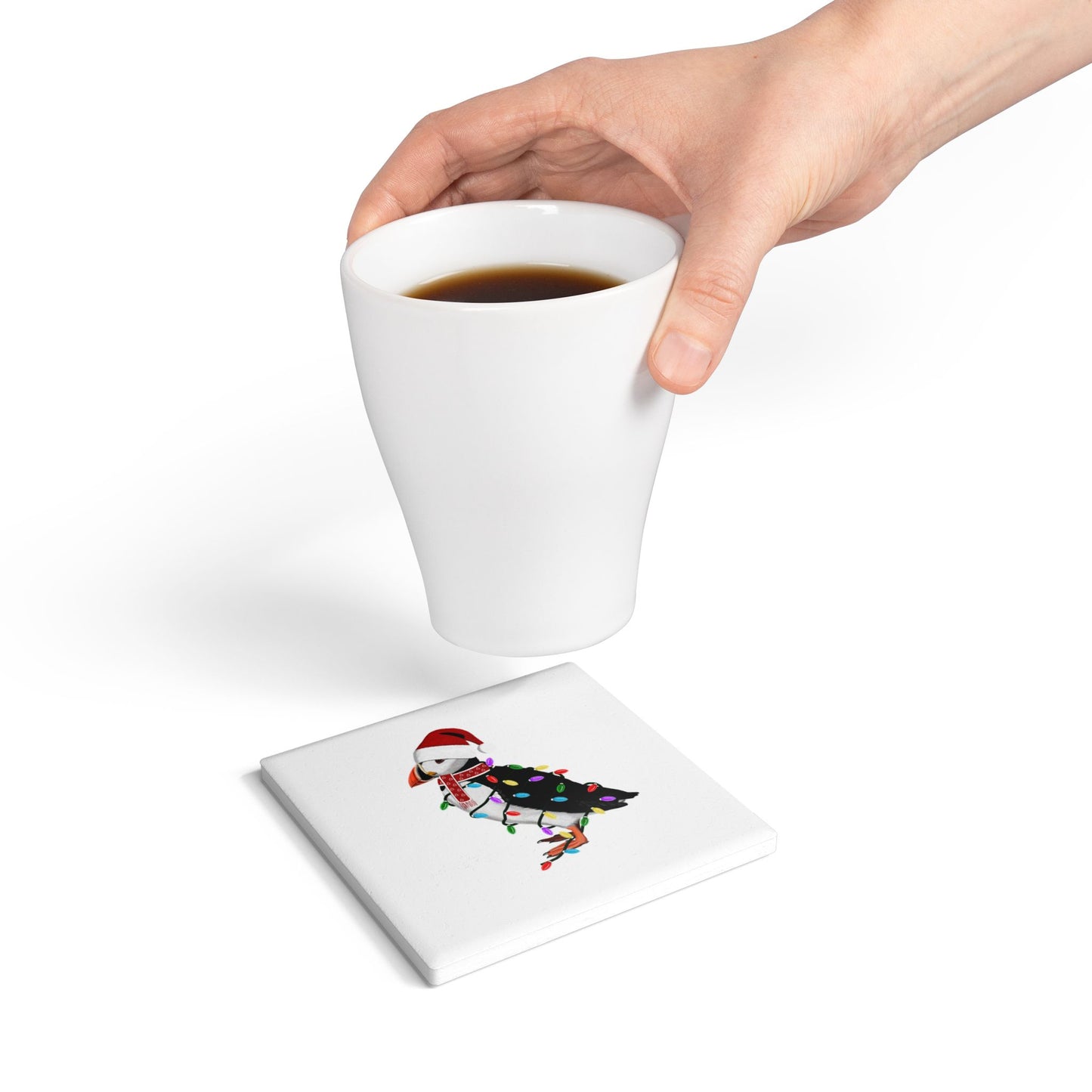 Keramik-Untersetzer Papageitaucher als Weihnachtsmann mit Lichterkette Weihnachtliches Vogel-Motiv