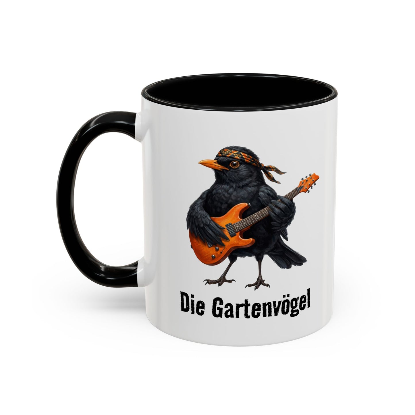 Tasse mit einer Amsel, die Gitarre spielt, und dem Text „Die Gartenvögel“ auf weißem Hintergrund