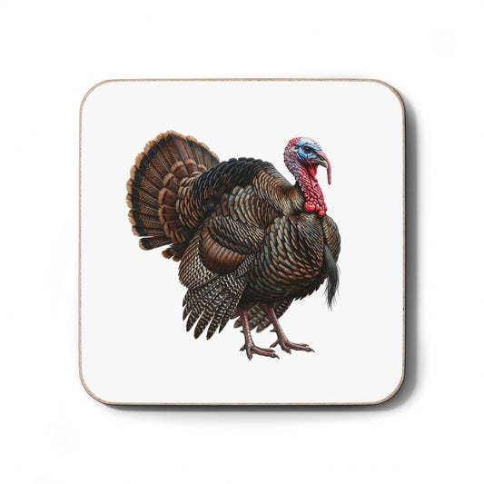 A square coaster with rounded corners featuring a detailed illustration of a male wild turkey on a white background, with a thin brown border.