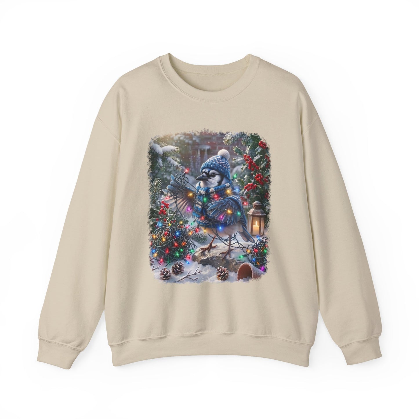 A beige crewneck sweatshirt featuring a large, colorful Christmas blue jay graphic on the chest, displayed against a solid white background.