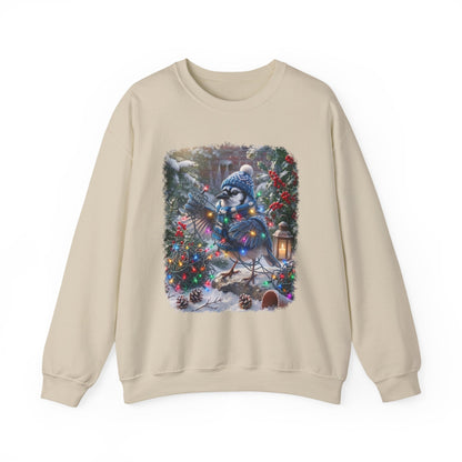 A beige crewneck sweatshirt featuring a large, colorful Christmas blue jay graphic on the chest, displayed against a solid white background.