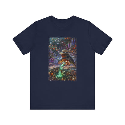 Soft premium Bella Canvas 3001 navy blue T-shirt featuring a digitally painted illustration of a cute bird named Robin Rosi pouring a glowing green magic potion from a watering can onto dried flowers.