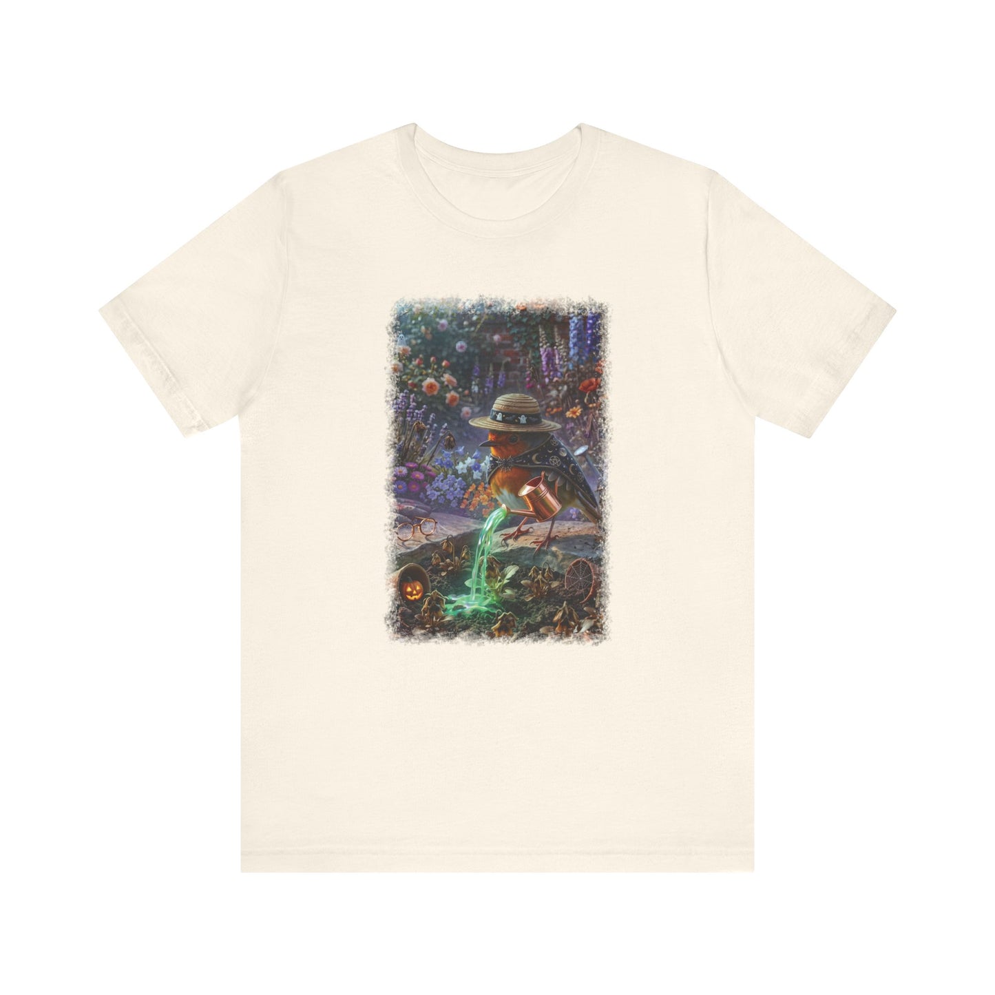 Soft premium Bella Canvas 3001 natural T-shirt featuring a digitally painted illustration of a cute bird named Robin Rosi pouring a glowing green magic potion from a watering can onto dried flowers.