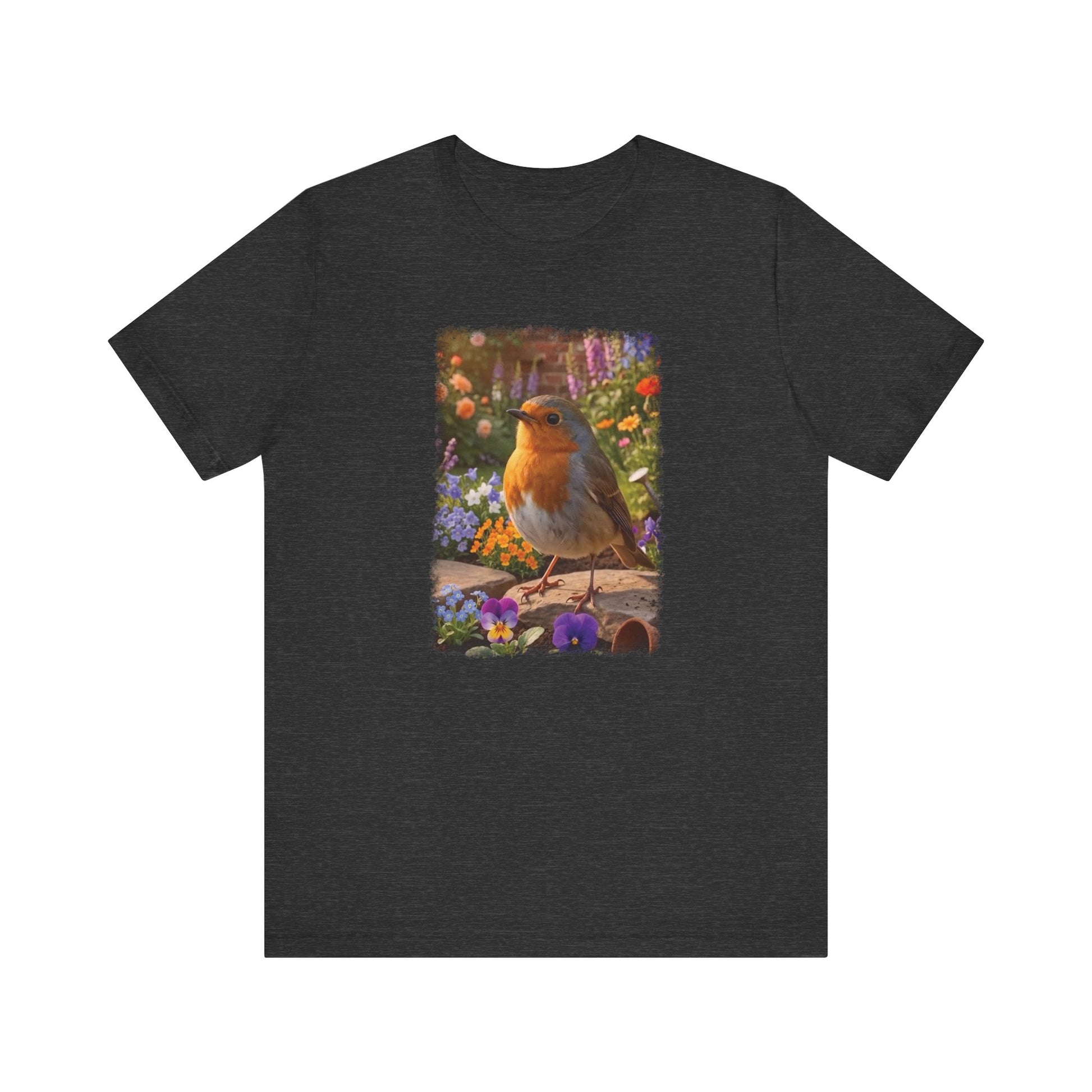 A dark heather gray short-sleeve t-shirt with a colorful graphic print of a robin bird perched among purple, yellow, and blue flowers on a wooden fence.