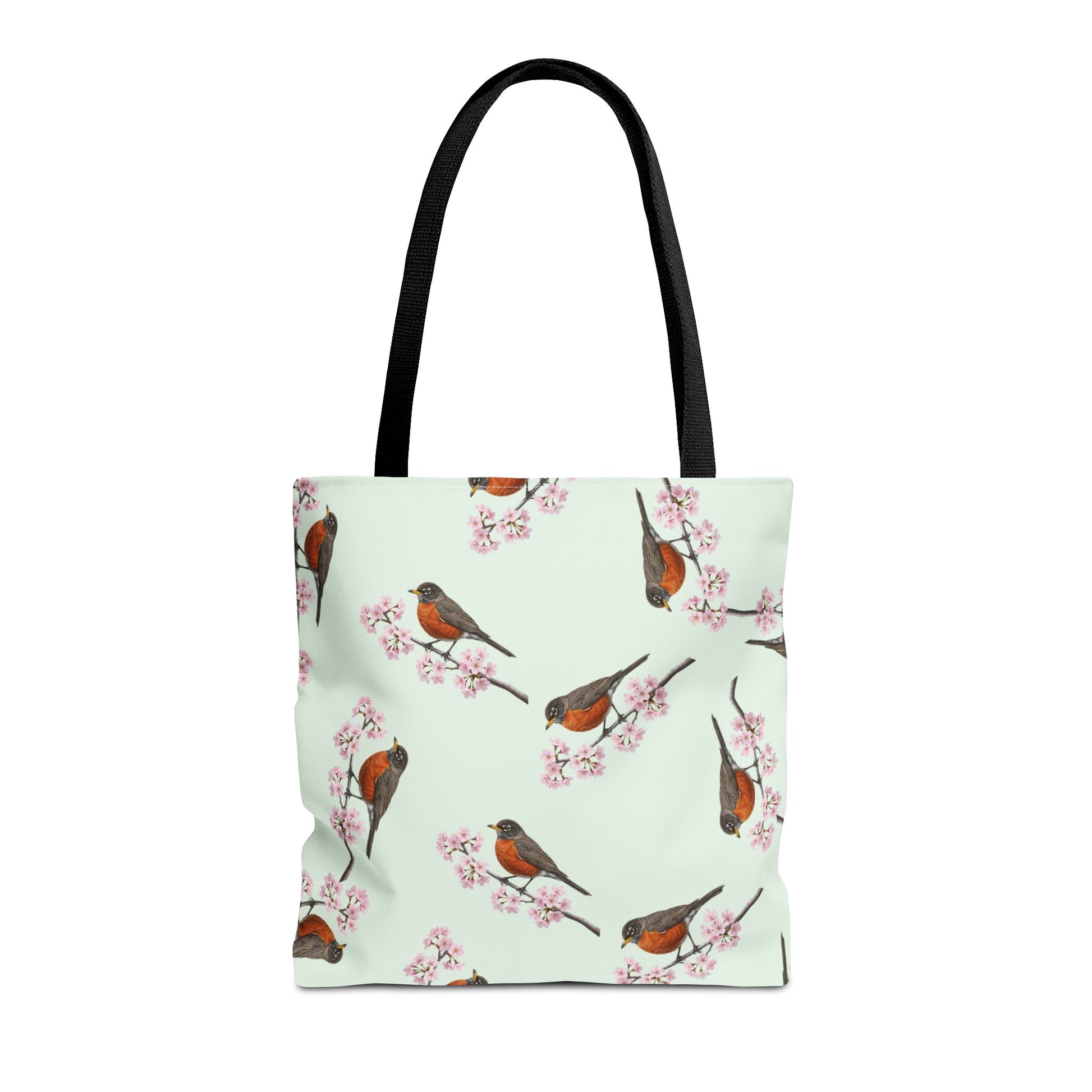 Tote bag with an american robin bird and cherry blossom pattern on a light green background
