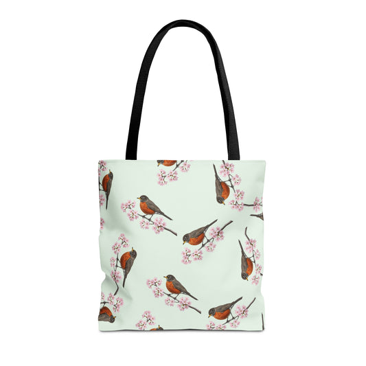 Tote bag with an american robin bird and cherry blossom pattern on a light green background