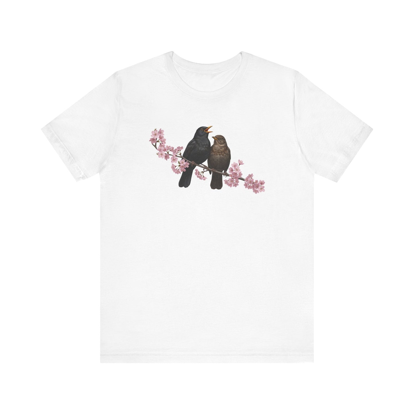 White t-shirt with two birds on a branch design on a white background