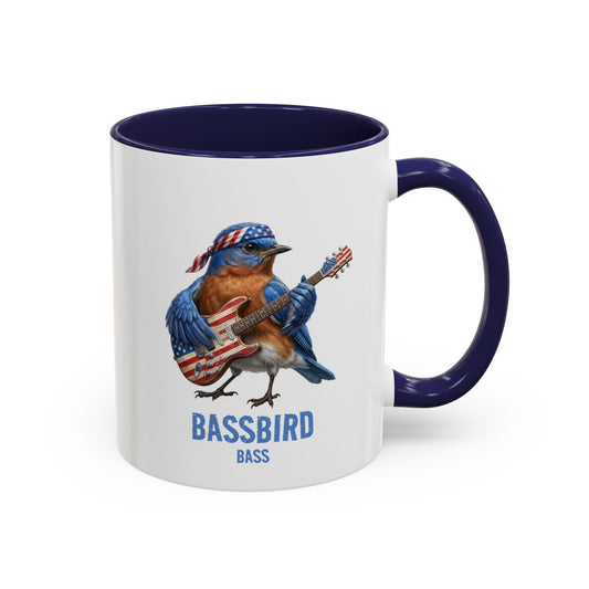 Mug with a graphic of a bird playing a bass guitar and the text 'BASSBIRD BASS' on a white background.