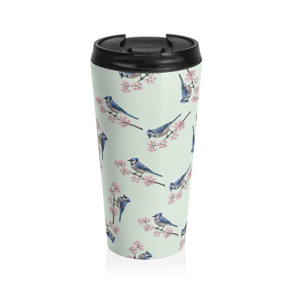 A premium 15oz stainless steel travel tumbler in sage green, featuring a seamless pattern of a Blue Jay and cherry blossoms, with a black spill-proof lid. High-quality birdwatching coffee mug in e-commerce.
