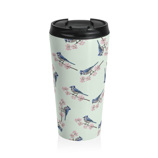 A premium 15oz stainless steel travel tumbler in sage green, featuring a seamless pattern of a Blue Jay and cherry blossoms, with a black spill-proof lid. High-quality birdwatching coffee mug in e-commerce.
