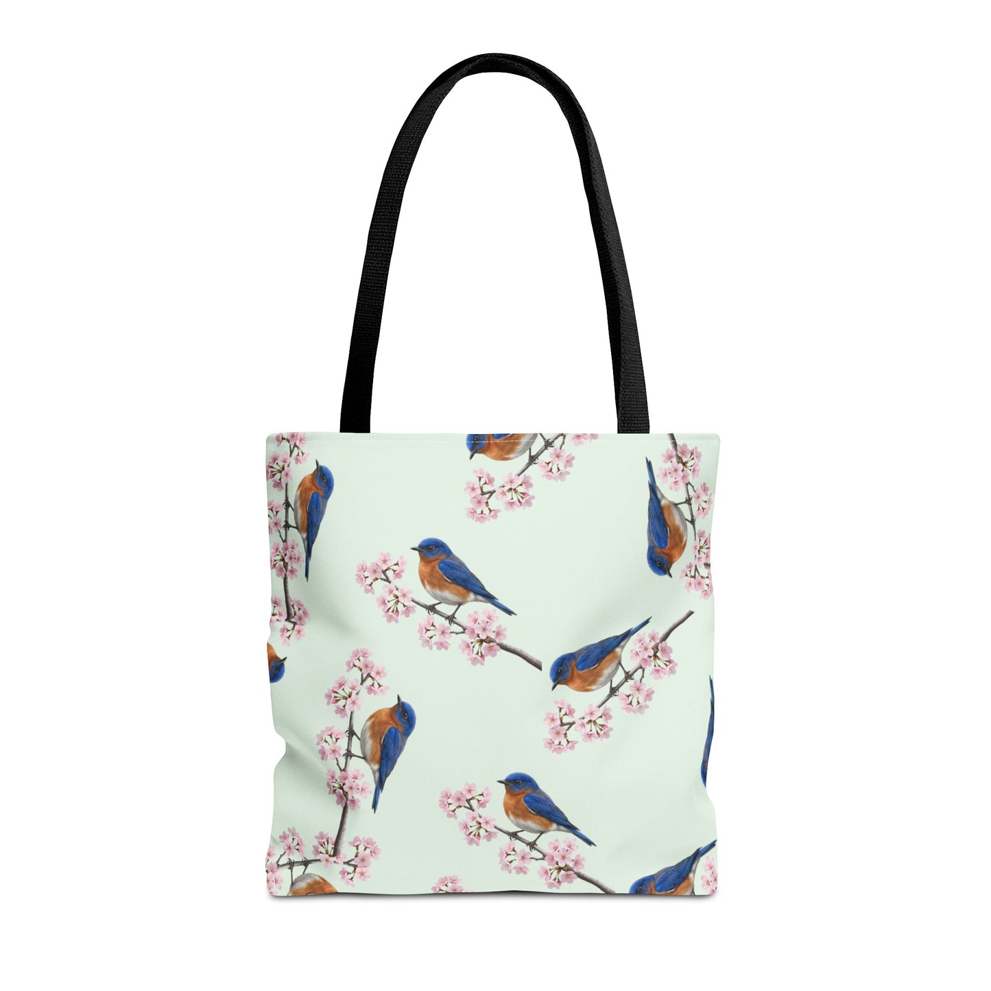 Tote bag with bluebird and cherry blossom pattern on a white background