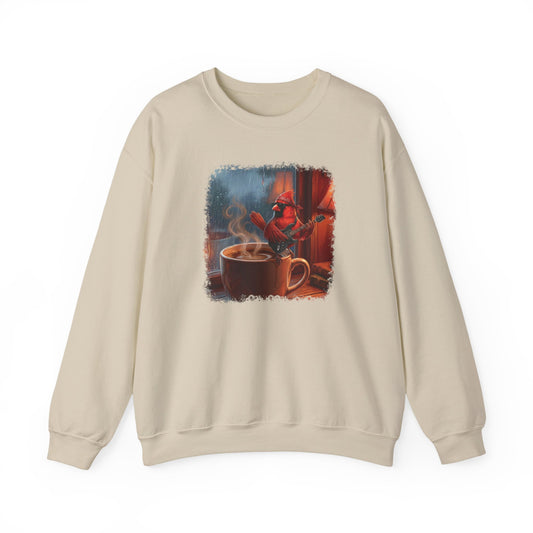 Beige sweatshirt with a graphic of a mug of steaming coffee and a cozy room on a white background