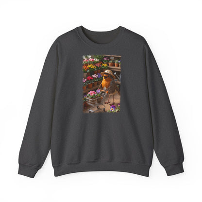 Digital gemalte Illustration eines glücklichen Rotkehlchens mit Sonnenhut, das an einer Blume schnuppert und einen vollen Einkaufswagen schiebt, gedruckt mit weichen Acryl-Kanten auf einem warmen Unisex-Sweatshirt.