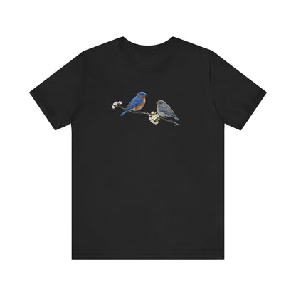 Black t-shirt with blue birds design on a white background
