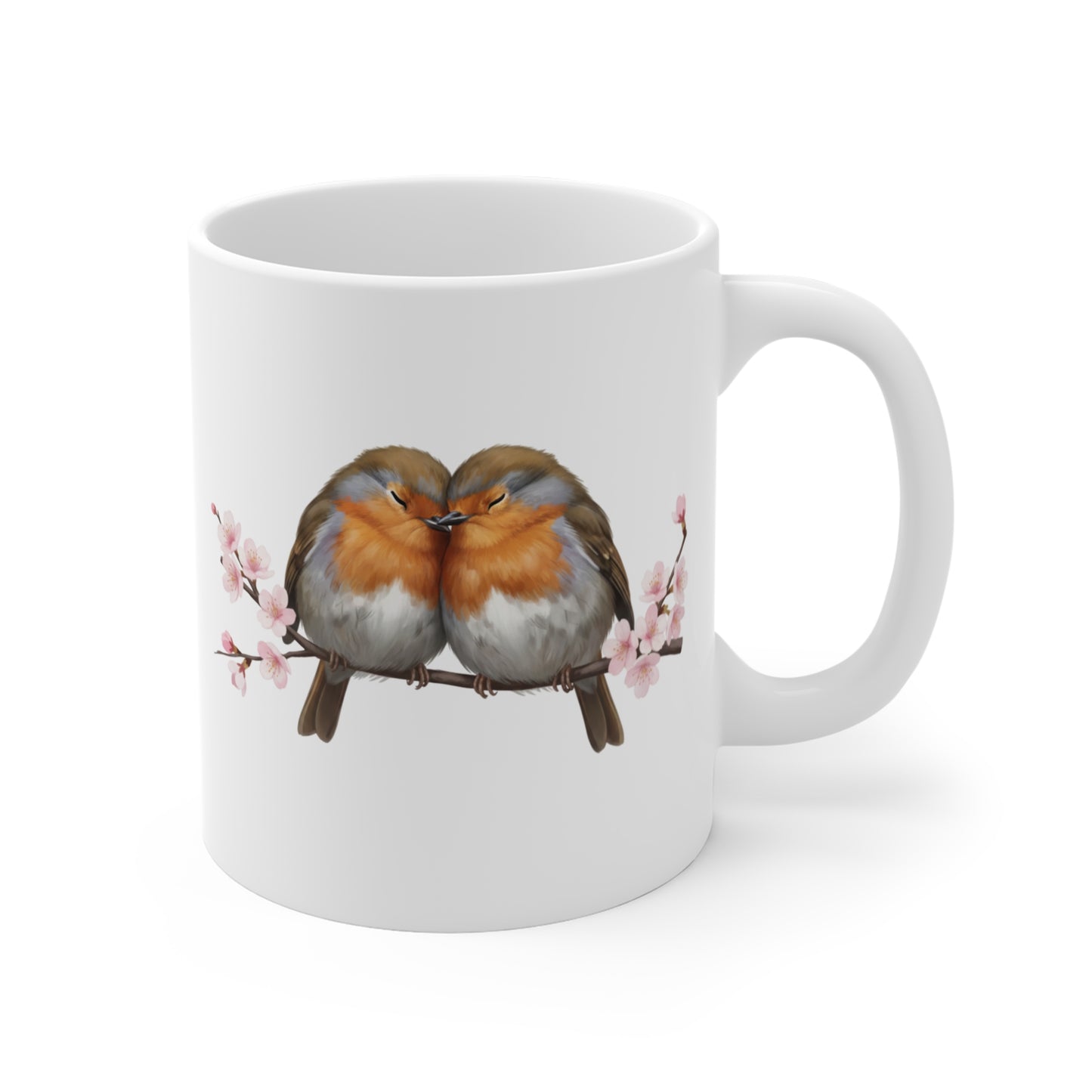 White mug with two birds on a branch design on a white background