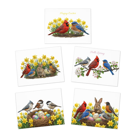A set of 5 assorted spring and Easter greeting cards fanned out. Designs feature realistic art of bunnies in daffodils, a bird nest with Easter eggs, and a Cardinal and Bluebird on pink apple blossoms.