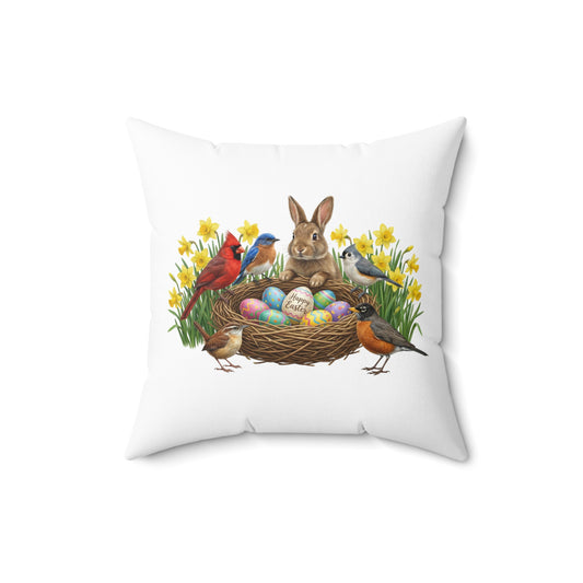 Decorative pillow with Easter design featuring a rabbit, birds, and eggs on a white background