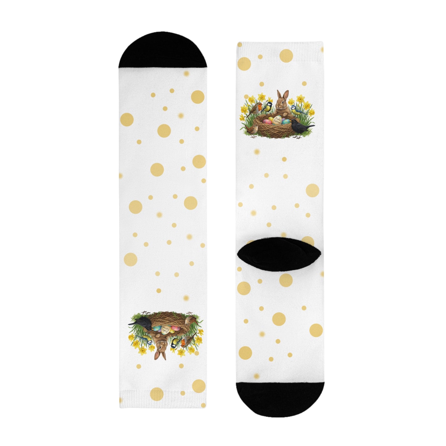 Two socks with polka dot patterns and Easter-themed designs with a bunny and birds on a white background