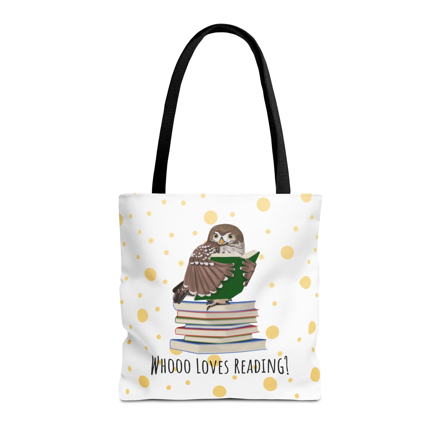 A white tote bag with black handles, decorated with a central illustration of a brown owl perched on a stack of books reading a green book. The bag has a white background with scattered gold polka dots and the text 'WHOOO LOVES READING!' printed below the illustration.