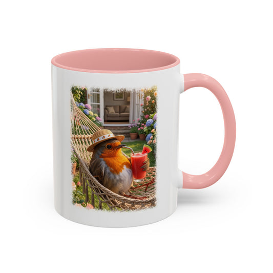 Zweifarbige Keramiktasse mit dem Rosi Rotkehlchen Motiv. Die digitale Illustration zeigt das heimische Rotkehlchen entspannt in einer Hängematte liegend, während es einen Wassermelonen-Smoothie sicher mit den Flügeln festhält.