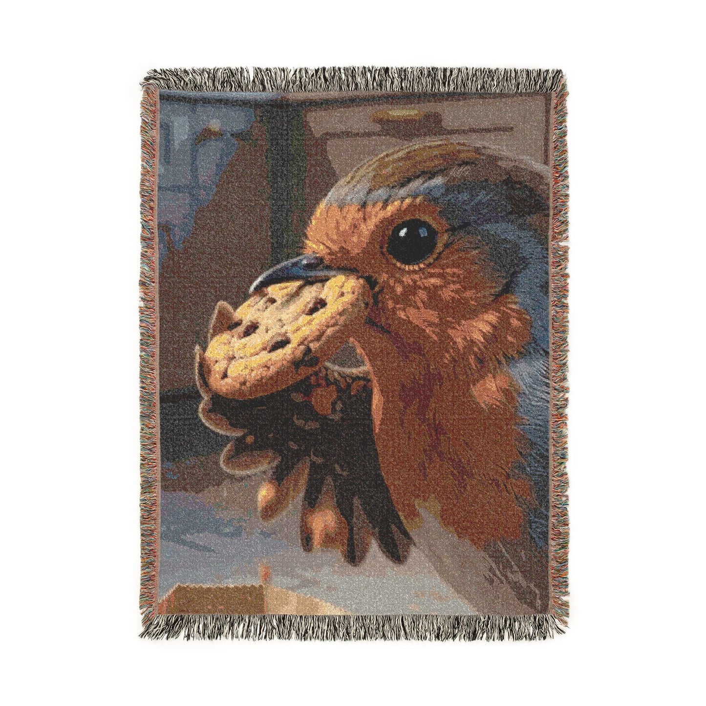 A rectangular woven throw blanket with fringed edges, featuring a detailed tapestry-style illustration of a robin bird pecking a cookie. The design has earthy tones of brown, beige, gray, and blue, shown against a plain white background.